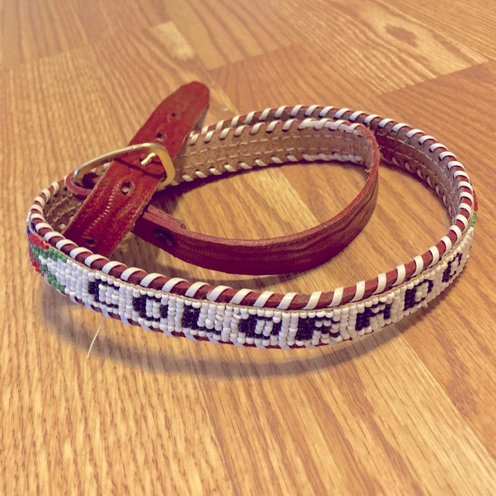 Vintage beaded tooled leather Colorado camp belt